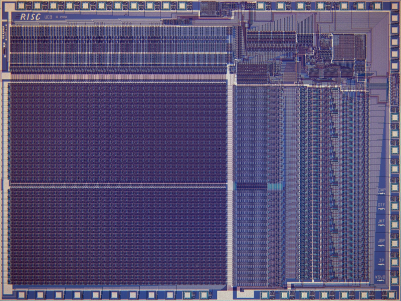  Поверхность процессора RISC I, изготовленного в 1981 г. по 2-мкм техпроцессу. Обширное двухчастное поле слева внизу — зона регистровой памяти, а все логические контуры уместились в существенно меньшей области в правом верхнем квадранте (источник: University of California, Berkeley) 